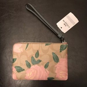Coach signature floral wristlet
